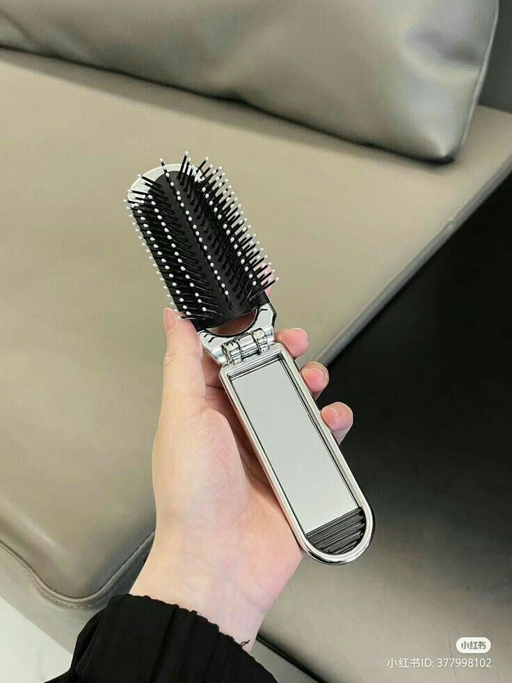 Foldable hair brush with mirror